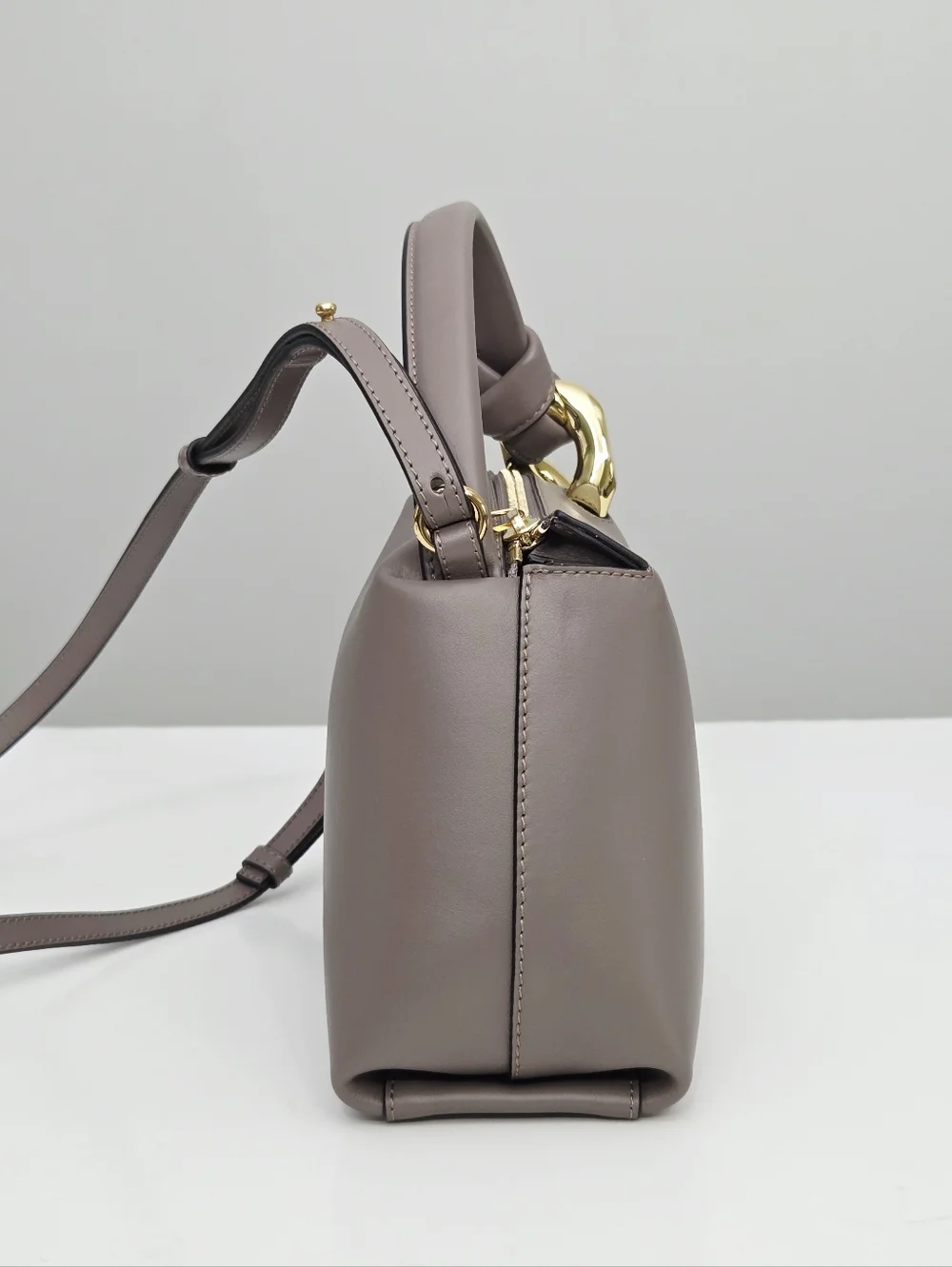JW ANDERSON THE JWA SMALL CORNER BAG - TAUPE LEATHER